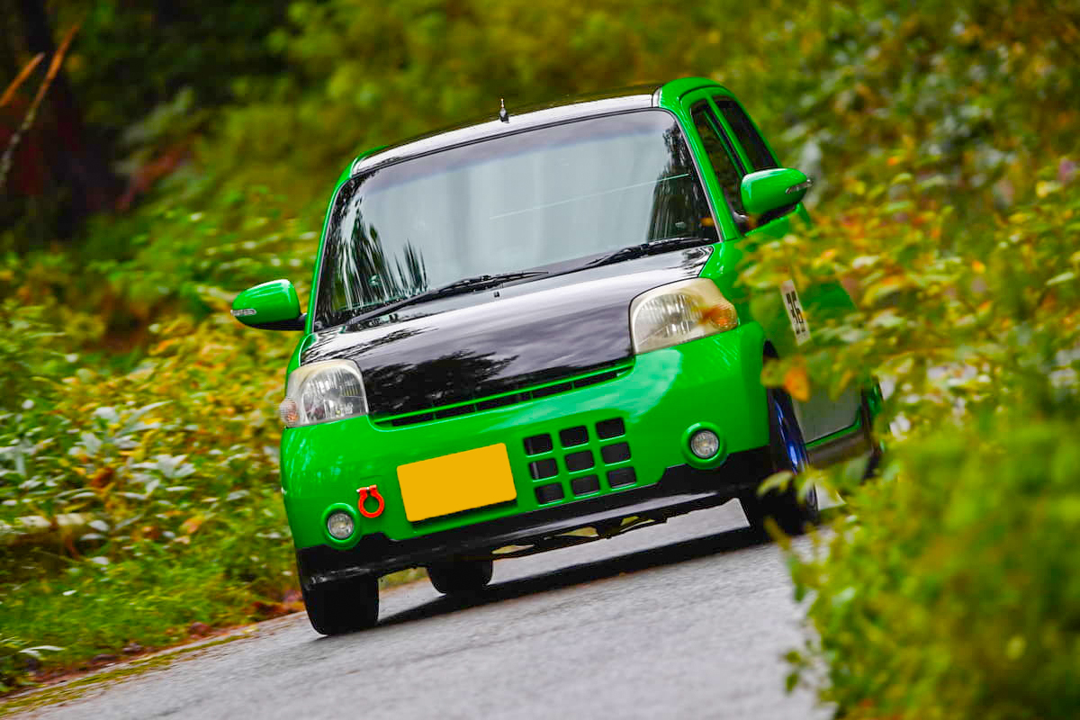 ダイハツ メッセだけのワンメイクレース ウェット路面のヒルクライムを攻めまくる Ajec Auto Messe Web カスタム アウトドア 福祉車両 モータースポーツなどのカーライフ情報が満載